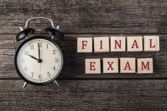  Image of a clock and the text final exam